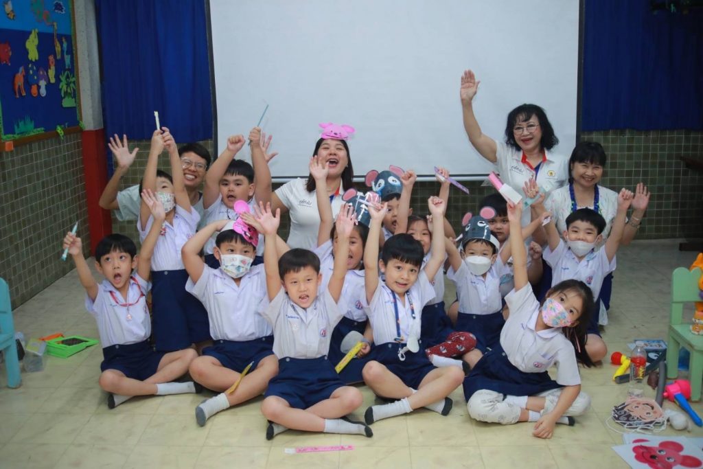 Kids and teachers cheering during their Dharma class by Innocent Perception Centre BMSBH teachers.